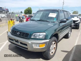 2000 Toyota RAV4 z VIN JT3GP10V0Y7077311, wystawiony jako IAAI lot #42316525 z przebiegiem 299 397 mil mil oraz . Historia ofert i sprzedaży dostępna na DreamBid. Obrazek 2.