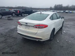 2017 Ford Fusion S with VIN 3FA6P0G77HR235084, listed as a IAAI auction lot 41582306 with 113,325 mi miles. Bid and sale history available at carsss.com. Image 4.