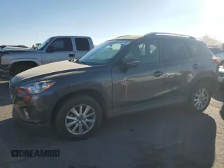2016 Mazda CX-5 Touring with VIN JM3KE2CYXG0906293, listed as a Copart auction lot 46484185 with 89,544 mi miles and Salvage Title. Bid and sale history available at carsss.com. Image 1.