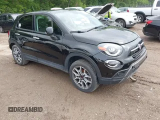 2021 FIAT 500X Trekking with VIN ZFBNF3B17MP888029, listed as a IAAI auction lot 42376154 with 28,961 mi miles and . Bid and sale history available at DreamBid. Image 1.