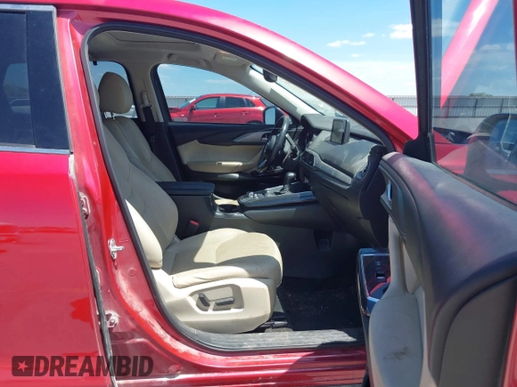 2016 Mazda CX-9 Touring with VIN JM3TCBCY5G0104504, listed as a IAAI auction lot 42314649 with 116,536 mi miles and . Bid and sale history available at DreamBid. Image 5.