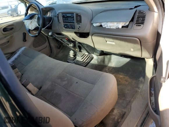 2003 Ford F-150 XL z VIN 1FTRF18243NB75182, wystawiony jako Copart lot #41501655 z przebiegiem Nie podano mil oraz Szkoda całkowita • Salvage title. Historia ofert i sprzedaży dostępna na DreamBid. Obrazek 8.