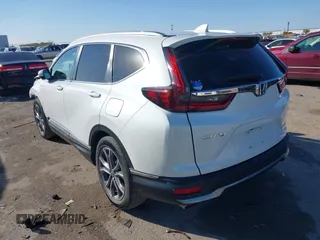 2021 Honda CR-V Touring with VIN 2HKRW1H9XMH402745, listed as a IAAI auction lot 41059541 with 24,282 mi miles. Bid and sale history available at carsss.com. Image 3.