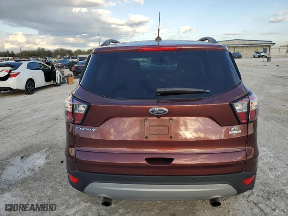 2018 Ford Escape SE with VIN 1FMCU0GD1JUB85143, listed as a Copart auction lot 47042535 with 0 mi miles and Salvage Title. Bid and sale history available at carsss.com. Image 6.