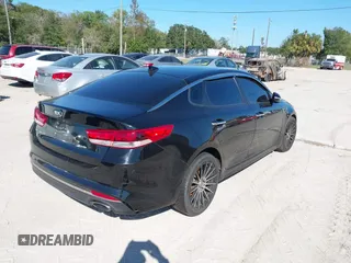 2018 Kia Optima LX with VIN 5XXGT4L3XJG203237, listed as a IAAI auction lot 40631696 with 157,012 mi miles and . Bid and sale history available at DreamBid. Image 4.