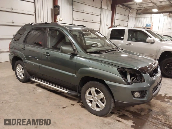 2009 Kia Sportage LX with VIN KNDJE723097558182, listed as a IAAI auction lot 41295142 with 147,200 mi miles. Bid and sale history available at carsss.com. Image 1.