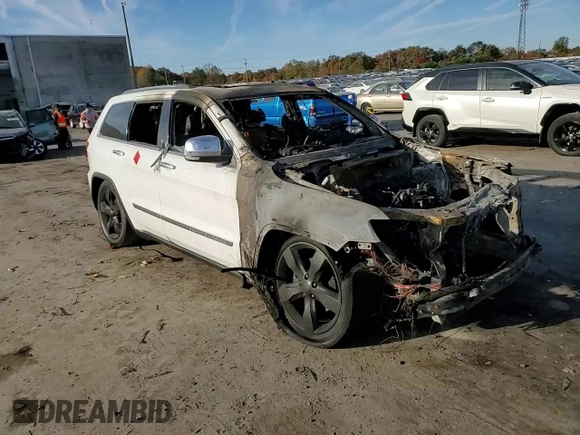2013 Jeep Grand Cherokee Overland with VIN 1C4RJFCG5DC639401, listed as a Copart auction lot 79003094 with 0 mi miles and Salvage Title. Bid and sale history available at carsss.com. Image 12.