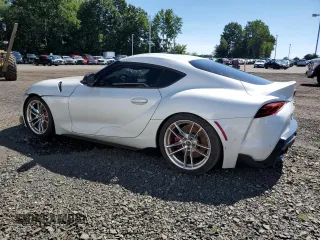 2021 Toyota GR Supra 3.0 with VIN WZ1DB0C0XMW037925, listed as a Copart auction lot 67085904 with 24,458 mi miles and Salvage Title. Bid and sale history available at carsss.com. Image 2.