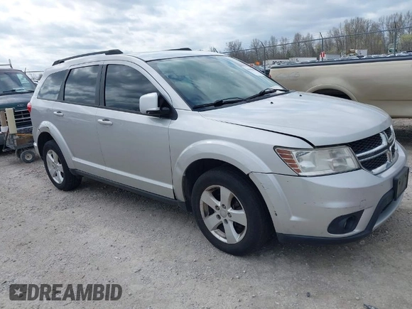 2012 Dodge Journey SXT z VIN 3C4PDDBG2CT249377, wystawiony jako IAAI lot #41948616 z przebiegiem 220 033 mil mil oraz . Historia ofert i sprzedaży dostępna na DreamBid. Obrazek 1.