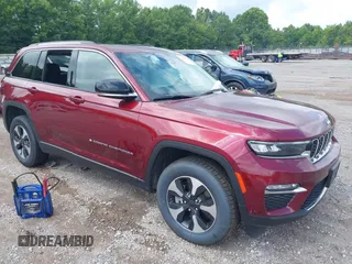 2023 Jeep Grand Cherokee with VIN 1C4RJYB60PC649357, listed as a IAAI auction lot 42707549 with 50,441 mi miles and . Bid and sale history available at DreamBid. Image 1.