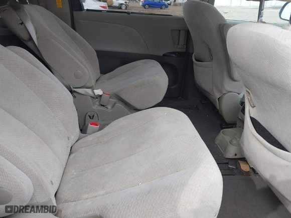 2014 Toyota Sienna LE AAS with VIN 5TDKK3DC6ES433383, listed as a IAAI auction lot 41607527 with 115,235 mi miles. Bid and sale history available at carsss.com. Image 8.