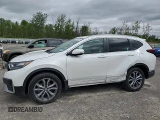 2021 Honda CR-V Touring z VIN 2HKRW2H96MH648097, wystawiony jako Copart lot #57467875 z przebiegiem Nie podano mil oraz Szkoda całkowita • Salvage title. Historia ofert i sprzedaży dostępna na DreamBid. Obrazek 1.