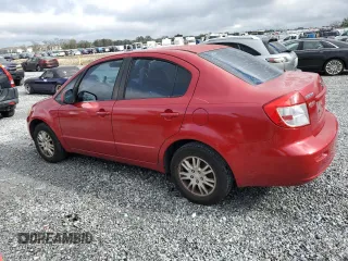 2012 Suzuki SX4 LE with VIN JS2YC5A39C6300577, listed as a Copart auction lot 86998944 with 103,354 mi miles and Non Repairable. Bid and sale history available at carsss.com. Image 2.