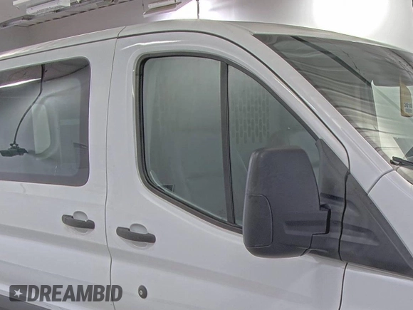 2019 Ford Transit with VIN 1FTYE1YM0KKB31938, listed as a IAAI auction lot 42667322 with 196,239 mi miles and . Bid and sale history available at DreamBid. Image 7.