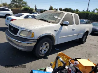 2001 Ford F-150 XL with VIN 1FTZX17271KF28673, listed as a Copart auction lot 65750145 with Not provided miles and Clean title. Bid and sale history available at DreamBid. Image 1.