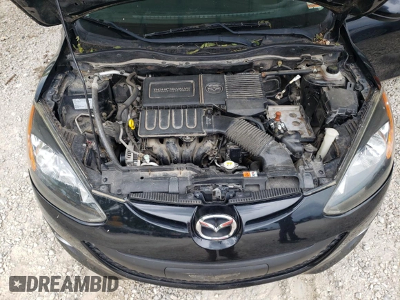 2014 Mazda 2 Touring z VIN JM1DE1LY9E0175946, wystawiony jako Copart lot #55459255 z przebiegiem 109 494 mil mil oraz Szkoda całkowita • Salvage title. Historia ofert i sprzedaży dostępna na DreamBid. Obrazek 12.