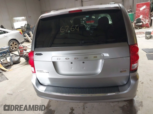 2014 Dodge Grand Caravan SXT z VIN 2C4RDGCGXER263963, wystawiony jako IAAI lot #41956264 z przebiegiem 138 815 mil mil oraz . Historia ofert i sprzedaży dostępna na DreamBid. Obrazek 16.