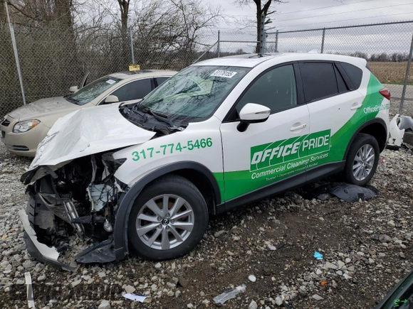 2016 Mazda CX-5 Touring with VIN JM3KE2CY4G0605549, listed as a Copart auction lot 51176155 with 0 mi miles and Salvage Title. Bid and sale history available at carsss.com. Image 1.