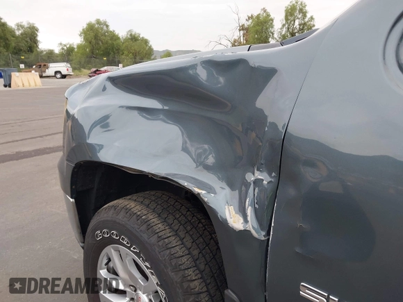 2012 GMC Sierra 1500 SLE with VIN 3GTP2VE75CG140105, listed as a IAAI auction lot 42074492 with 72,819 mi miles and . Bid and sale history available at DreamBid. Image 6.