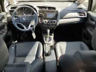 2015 Honda Fit EX-L z VIN 3HGGK5H88FM705989, wystawiony jako Copart lot #57143835 z przebiegiem 132 747 mil mil oraz Szkoda całkowita • Salvage title. Historia ofert i sprzedaży dostępna na DreamBid. Obrazek 8.