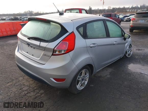 2019 Ford Fiesta SE z VIN 3FADP4EJ7KM147864, wystawiony jako IAAI lot #41692160 z przebiegiem 87 417 mil mil oraz . Historia ofert i sprzedaży dostępna na DreamBid. Obrazek 4.