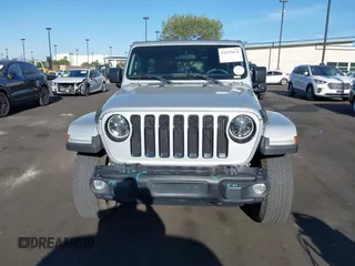 2023 Jeep Wrangler Willys with VIN 1C4HJXDG3PW577807, listed as a IAAI auction lot 42323674 with 28,808 mi miles and . Bid and sale history available at DreamBid. Image 12.