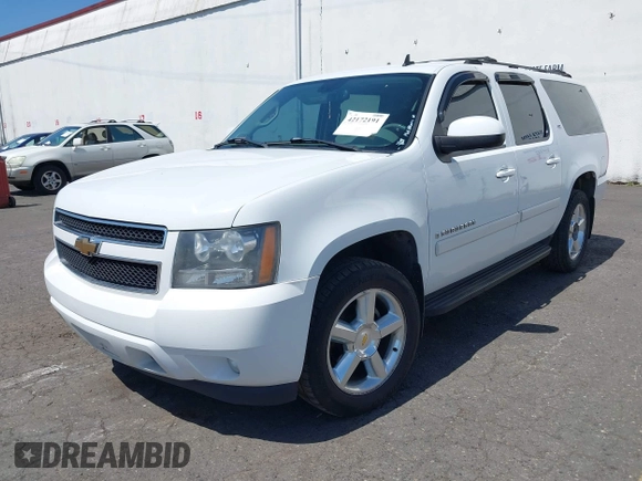 2007 Chevrolet Suburban LT with VIN 1GNFK16327J231618, listed as a IAAI auction lot 42172191 with 216,729 mi miles and . Bid and sale history available at DreamBid. Image 2.