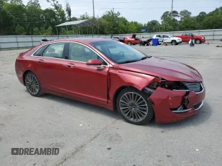 2014 Lincoln MKZ z VIN 3LN6L2GK4ER825465, wystawiony jako Copart lot #55911345 z przebiegiem 78 783 mil mil oraz Szkoda całkowita • Salvage title. Historia ofert i sprzedaży dostępna na DreamBid. Obrazek 4.