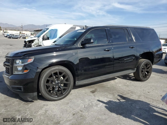 2018 Chevrolet Suburban LS with VIN 1GNSCGEC4JR383988, listed as a Copart auction lot 43199585 with 79,469 mi miles and Salvage Title. Bid and sale history available at carsss.com. Image 1.