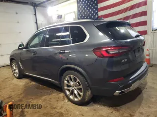 2021 BMW X5 xDrive40i with VIN 5UXCR6C06M9E05140, listed as a Copart auction lot 52402475 with 47,869 mi miles and Salvage title. Bid and sale history available at DreamBid. Image 2.