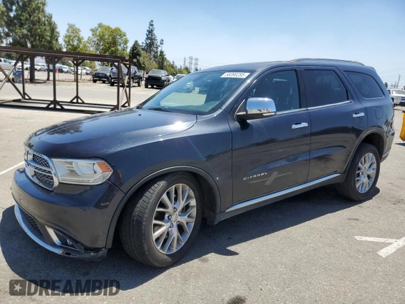 2014 Dodge Durango Citadel with VIN 1C4SDJET1EC594240, listed as a Copart auction lot 58090285 with 160,027 mi miles and Salvage title. Bid and sale history available at DreamBid. Image 1.