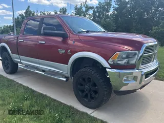 2012 Ram 2500 Laramie z VIN 3C6UD5FL8CG287373, wystawiony jako Copart lot #59392305 z przebiegiem 162 013 mil mil oraz Czysty tytuł • Clean title. Historia ofert i sprzedaży dostępna na DreamBid. Obrazek 1.