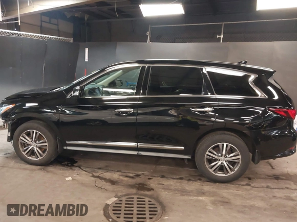 2020 Infiniti QX60 Luxe with VIN 5N1DL0MM4LC540617, listed as a IAAI auction lot 42232162 with 57,866 mi miles and . Bid and sale history available at DreamBid. Image 15.