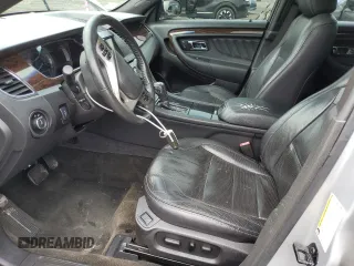 2013 Ford Taurus Limited z VIN 1FAHP2F89DG174546, wystawiony jako Copart lot #61003745 z przebiegiem 140 919 mil mil oraz Czysty tytuł • Clean title. Historia ofert i sprzedaży dostępna na DreamBid. Obrazek 7.