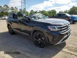 2023 Volkswagen Atlas SE with VIN 1V2WR2CA7PC500650, listed as a Copart auction lot 51973035 with 29,700 mi miles and Salvage title. Bid and sale history available at DreamBid. Image 4.