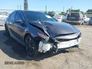2018 Toyota Camry XSE with VIN 4T1BZ1HK8JU021694, listed as a IAAI auction lot 42100920 with 83,351 mi miles and . Bid and sale history available at DreamBid. Image 1.