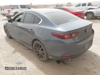 2023 Mazda 3 S Preferred with VIN 3MZBPACM8PM380055, listed as a IAAI auction lot 41804643 with 12,855 mi miles and . Bid and sale history available at DreamBid. Image 3.
