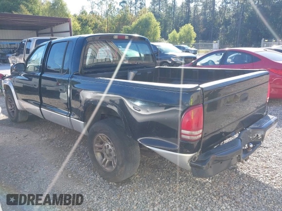 2003 Dodge Dakota SLT with VIN 1D7HL48X93S151422, listed as a IAAI auction lot 40661577 with 238,586 mi miles. Bid and sale history available at carsss.com. Image 3.