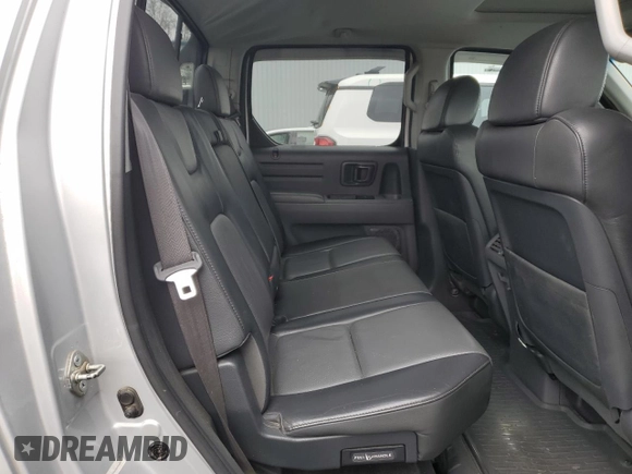 2006 Honda Ridgeline RTL z VIN 2HJYK16596H505685, wystawiony jako Copart lot #50351155 z przebiegiem 171 476 mil mil oraz Czysty tytuł • Clean title. Historia ofert i sprzedaży dostępna na DreamBid. Obrazek 10.