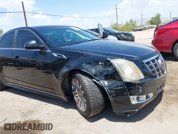 2012 Cadillac CTS Premium with VIN 1G6DP5E35C0129064, listed as a IAAI auction lot 42666308 with 151,694 mi miles and . Bid and sale history available at DreamBid. Image 6.