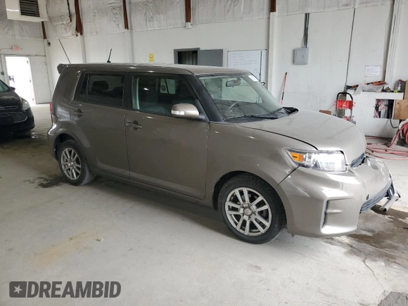 2012 Scion xB z VIN JTLZE4FE6C1145727, wystawiony jako Copart lot #54135915 z przebiegiem 111 652 mil mil oraz Szkody całkowita. Historia ofert i sprzedaży dostępna na DreamBid. Obrazek 4.
