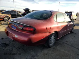 1998 Ford Taurus SE Comfort z VIN 1FAFP53S1WG176478, wystawiony jako Copart lot #80528034 z przebiegiem Nie podano mil oraz Szkoda całkowita • Salvage title. Historia ofert i sprzedaży dostępna na DreamBid. Obrazek 3.