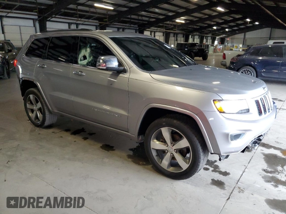 2015 Jeep Grand Cherokee High Altitude with VIN 1C4RJECG7FC781715, listed as a Copart auction lot 73321744 with 0 mi miles and Salvage Title. Bid and sale history available at carsss.com. Image 4.