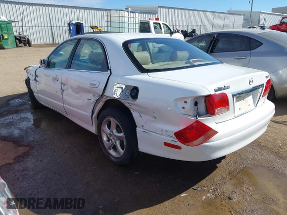 2002 Mazda Millenia S with VIN JM1TA222821725749, listed as a IAAI auction lot 41662948 with 165,088 mi miles and . Bid and sale history available at DreamBid. Image 3.