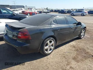 2007 Pontiac Grand Prix GXP with VIN 2G2WC58C571226261, listed as a IAAI auction lot 41487187 with 133,038 mi miles and . Bid and sale history available at DreamBid. Image 4.