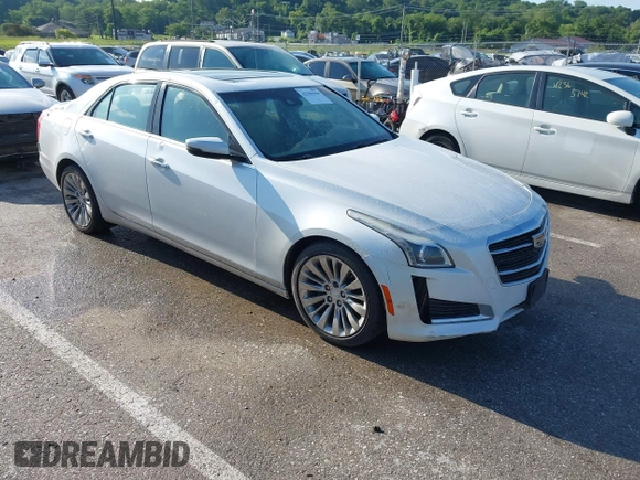 2015 Cadillac CTS Luxury AWD z VIN 1G6AX5SX9F0107244, wystawiony jako IAAI lot #42386444 z przebiegiem 171 413 mil mil oraz . Historia ofert i sprzedaży dostępna na DreamBid. Obrazek 1.