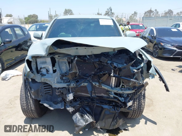 2022 Toyota Tacoma SR with VIN 3TYCZ5AN0NT104300, listed as a IAAI auction lot 42652503 with 18,071 mi miles and . Bid and sale history available at DreamBid. Image 13.