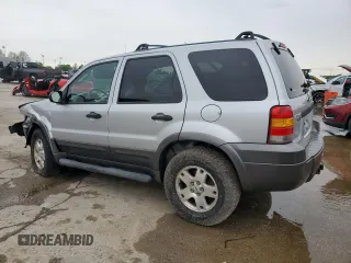 2006 Ford Escape XLT with VIN 1FMCU93156KA73772, listed as a Copart auction lot 55658445 with 217,335 mi miles and Salvage title. Bid and sale history available at DreamBid. Image 2.