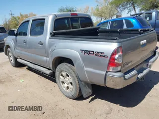 2015 Toyota Tacoma with VIN 3TMLU4EN6FM188736, listed as a IAAI auction lot 42605859 with 210,717 mi miles and . Bid and sale history available at DreamBid. Image 3.