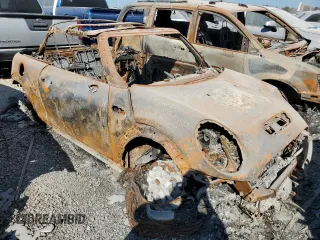 2018 MINI Convertible Cooper S with VIN WMWWG9C54J3D22545, listed as a Copart auction lot 73919684 with Not provided miles and Salvage title. Bid and sale history available at DreamBid. Image 4.